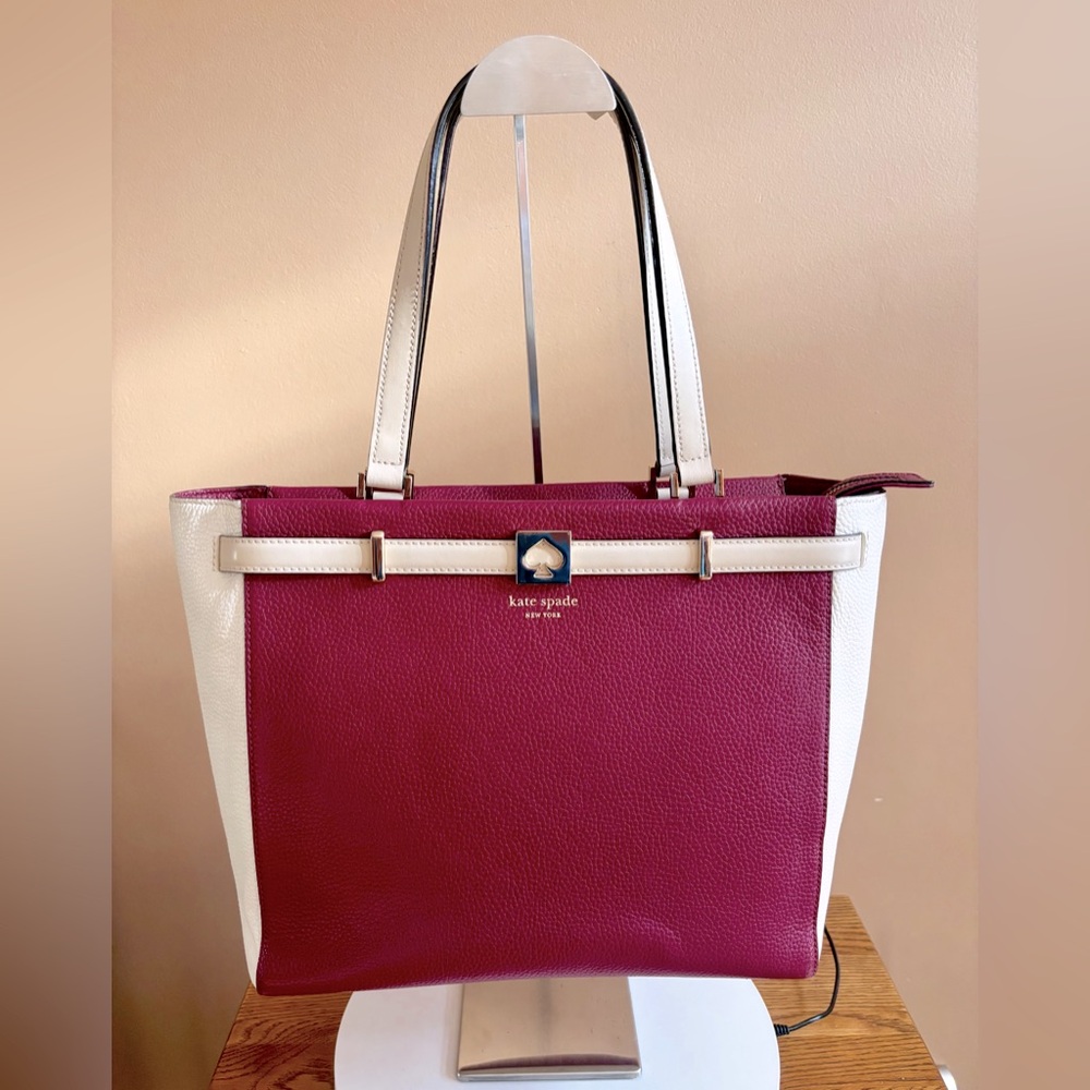 Kate Spade Burgundy and Cream Tote Bag
Pebbled leather
